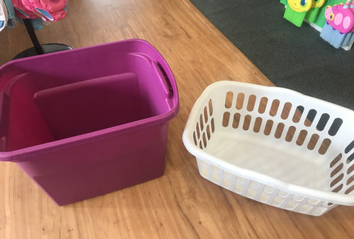 two empty plastic bins